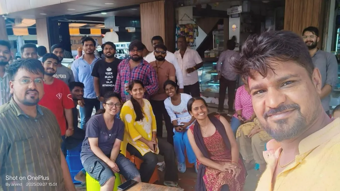 Students and staff gathered for a group photograph inside one of the centres